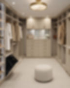 modern walk in closet with hidden hamper and lighting. Upscale closet design keeps closet organized and clothing accessible.