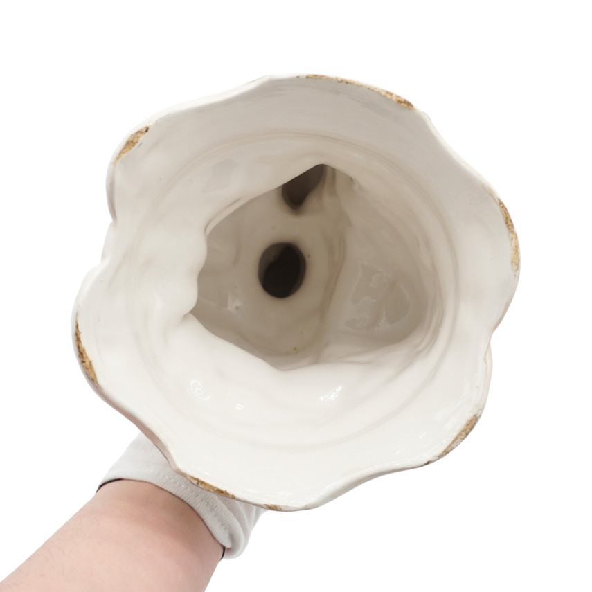 Porcelain Figurine of a Woman Holding a Basket of Flowers