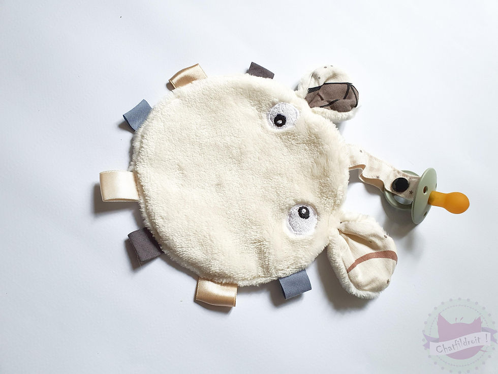 Miniature : Doudou étiquette blanc chauve-souris