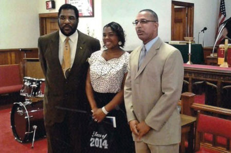 Three people standing