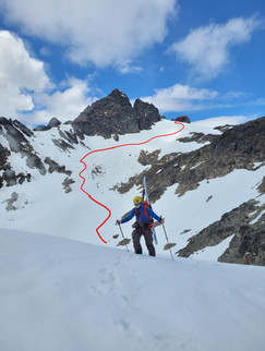 Baby Munday and our ski descent behind