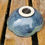 Thumbnail: Flower-Shaped Stoneware Serving Bowl – Deep Blue with Ocean Green Ripples