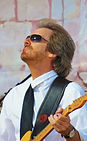 Reed Walsh has been writing and producing music since the 1970s. Working also as a bass and guitarist in a variety of tribut