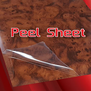 Clear peel sheet protective film masking a wood grain surface