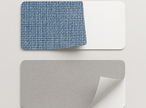 Sample swatches of laminated fabric and vinyl with backing layers