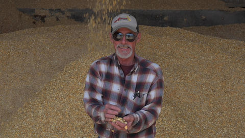 Man holding grain