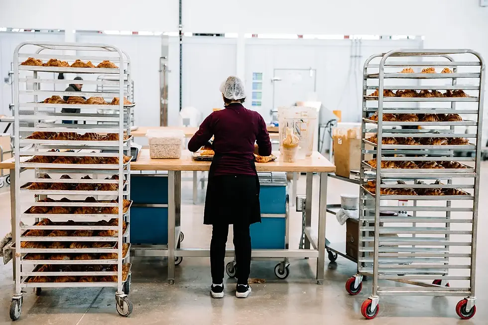 Worker demonstrating food safety and quality