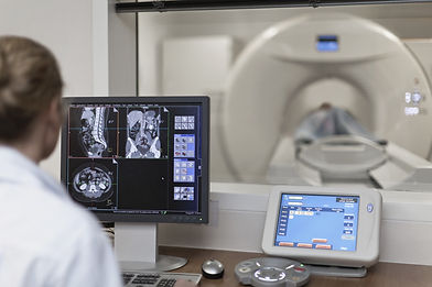 Doctor Operating CT Scanner_edited.jpg