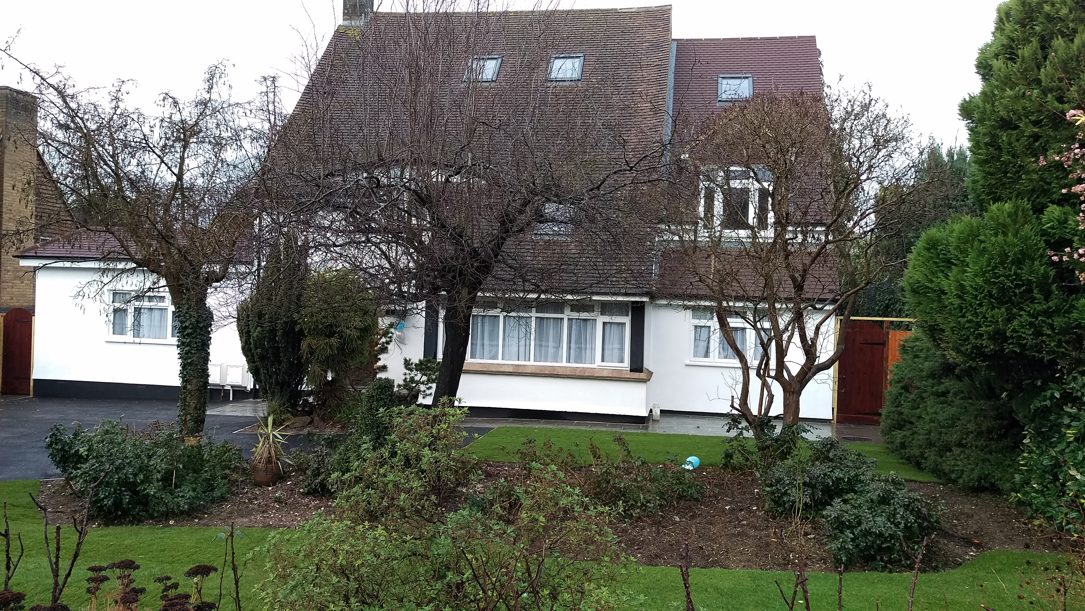 House extended/converted in flats.