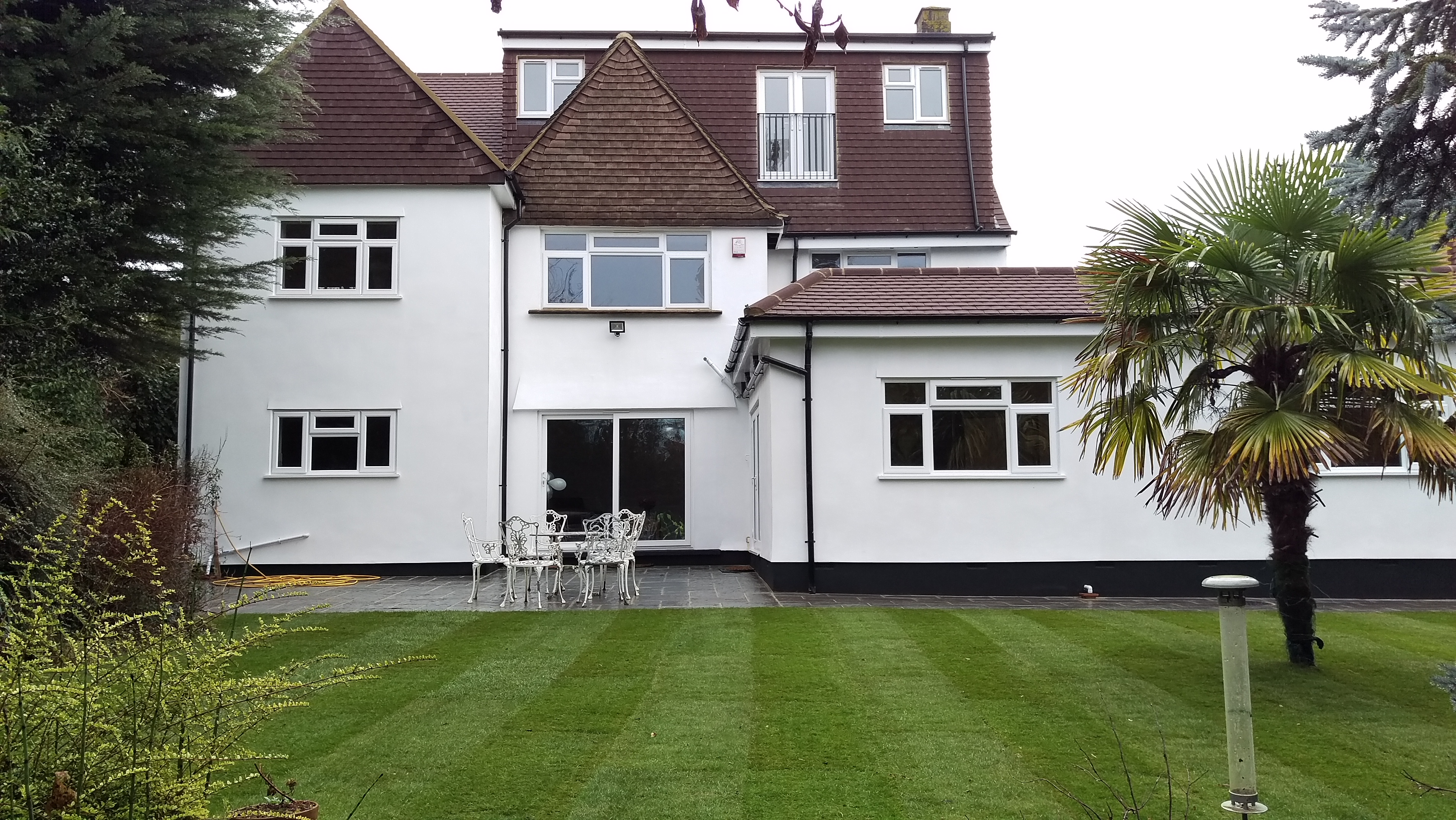 House extended/converted in flats.