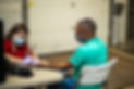 Community Service: Employee participating in blood drive