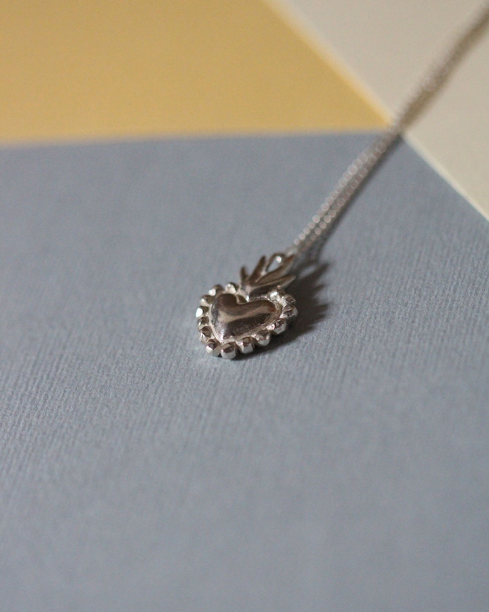 Thumbnail: le collier Coeur Sacré
