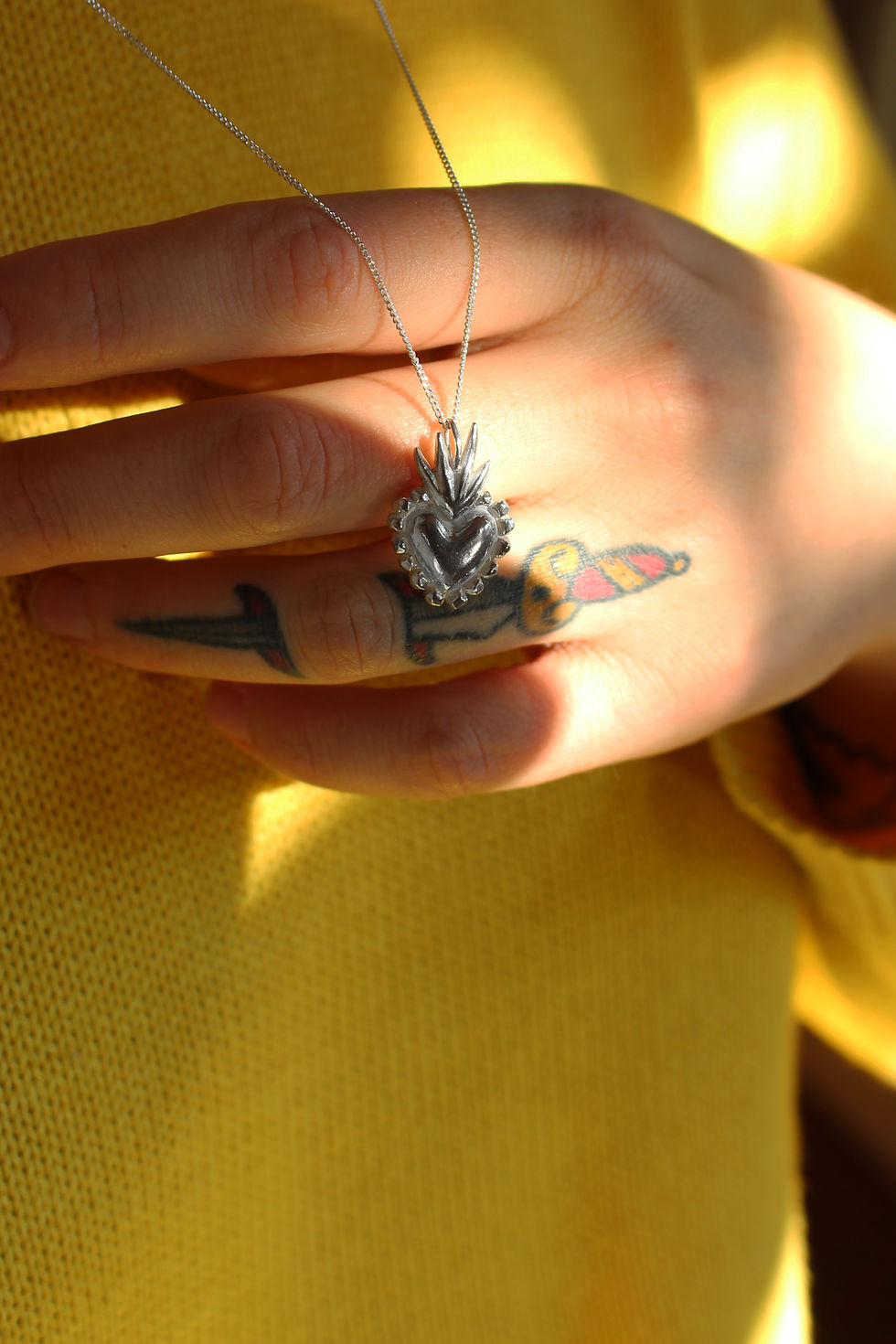 Thumbnail: le collier Coeur Sacré
