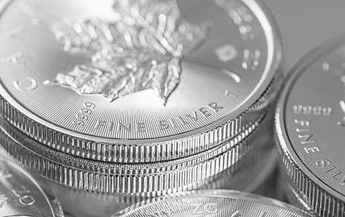 closeup-shot-maple-leaf-fine-silver-coins-from-royal-canadian-mint.jpg