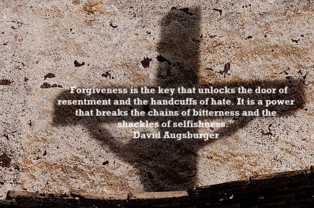 This picture is a quote from David Augsburger about forgiveness with the shadow of the cross in the background