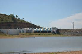 Scenic view of Hilly Farms by Channapatna featuring lush greenery, rolling hills, and serene farmland landscapes