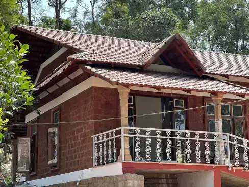 Anantara luxury property in Sakleshpur with scenic views, surrounded by greenery—perfect for peaceful living or real estate investment