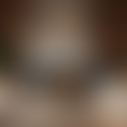 Eye-level view of a cozy living room with a modern fireplace