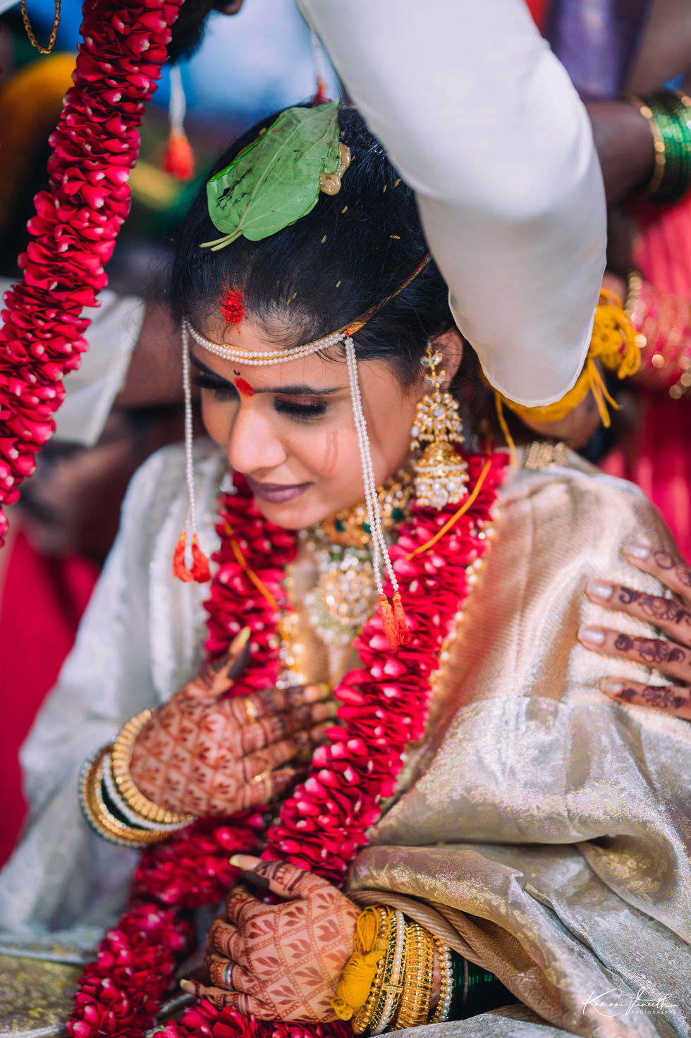 Groom tying mangalsutra in sacred ritual