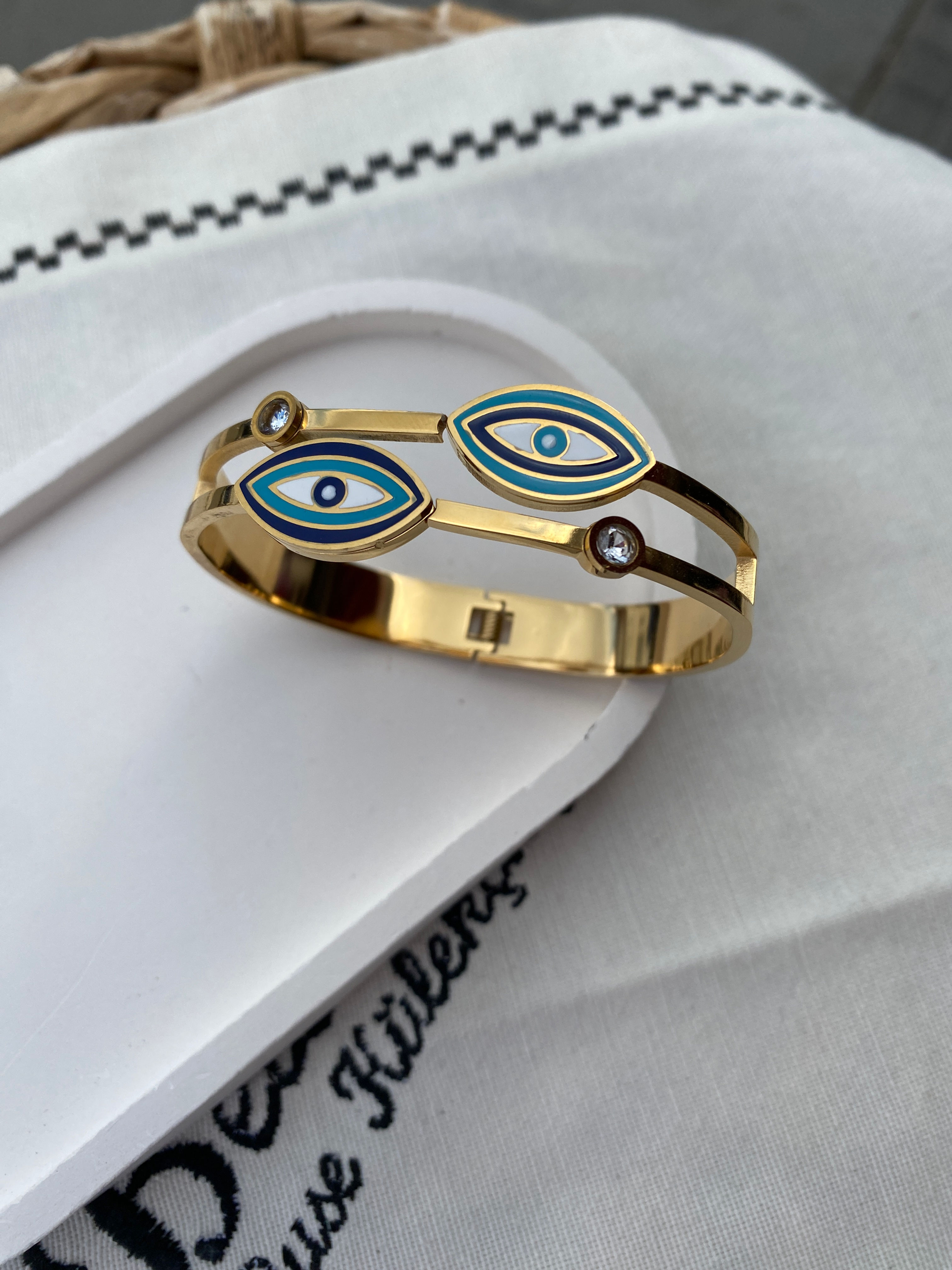 Göz detaylı gold çelik kepelçe SSKLP143