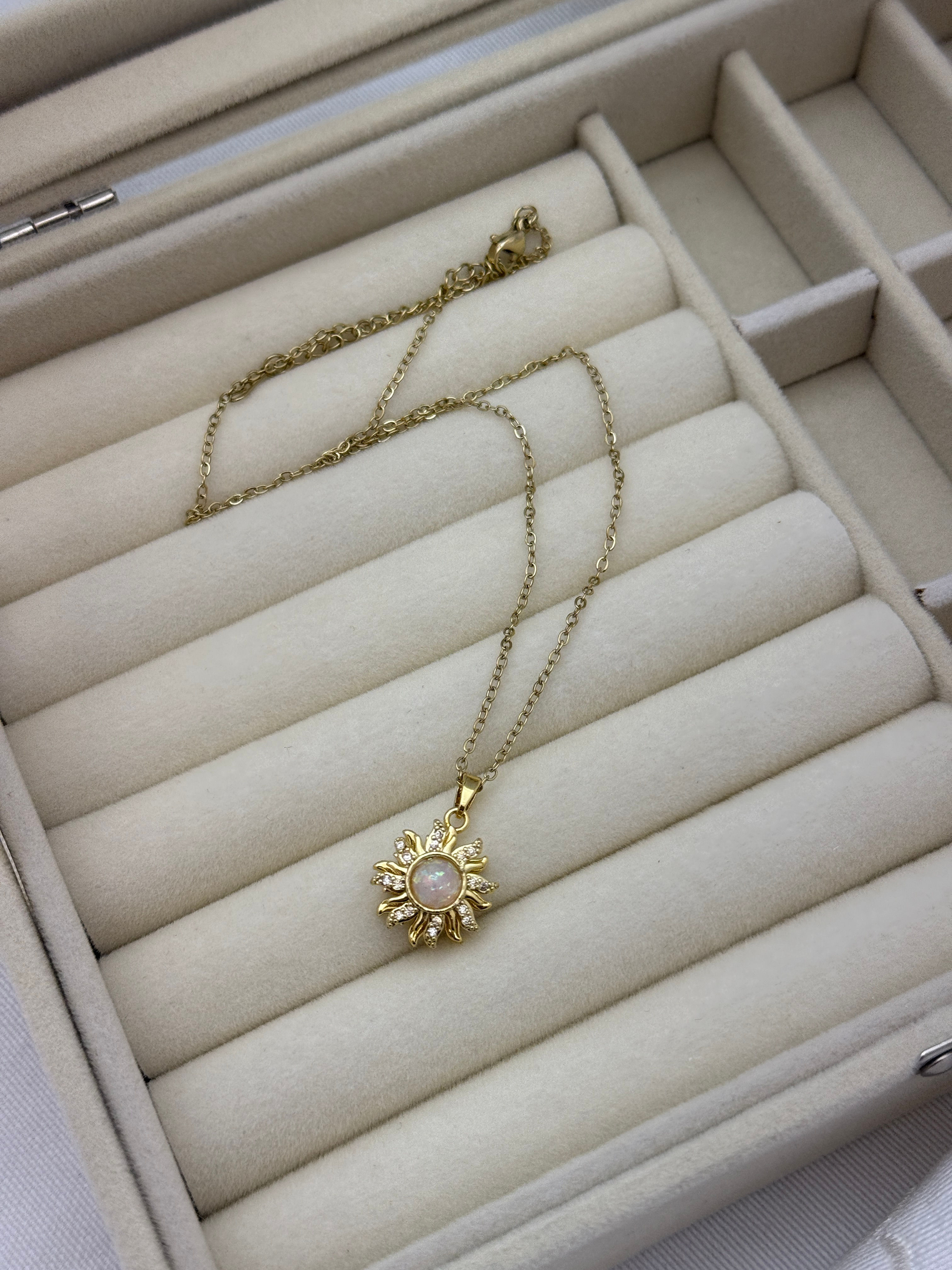 Gold çelik zincirli dönen güneş kolye B-0161