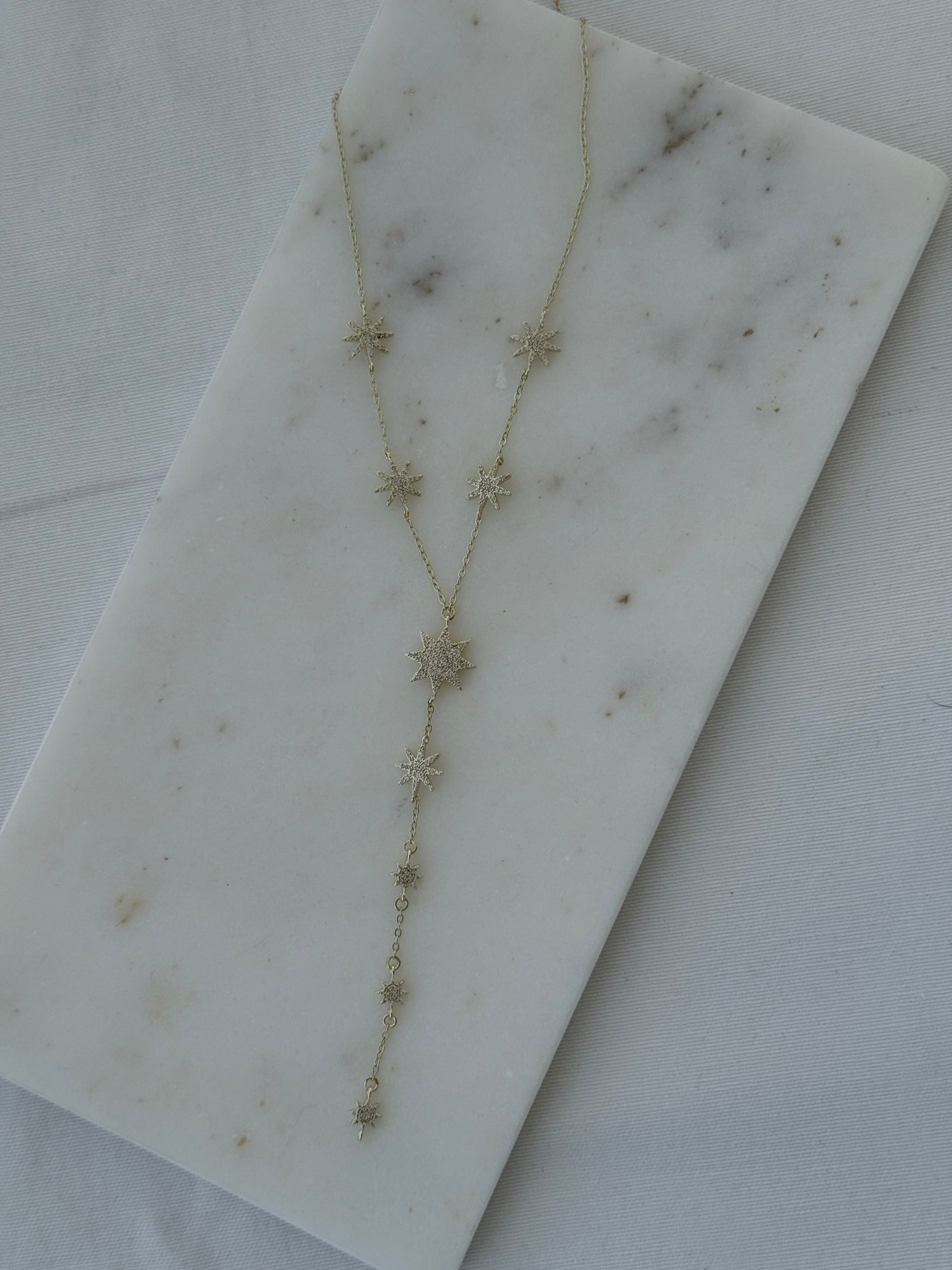 Gold taşlı kuzey yıldızı detaylı Y kolye DK-109