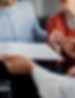 closeup-unrecognizable-couple-signing-contract-with-financial-advisor.jpg