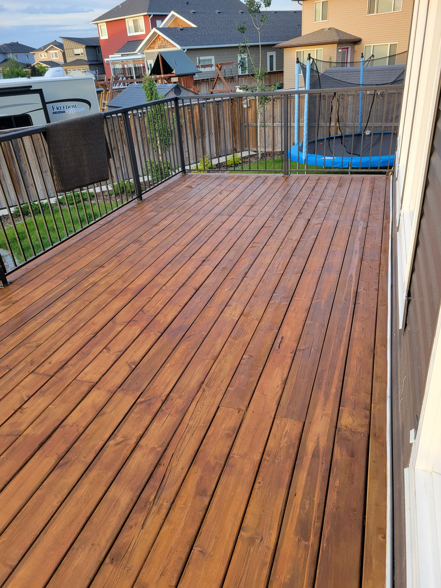 Landscape deck refinish (sand and stain) in High River, Alberta