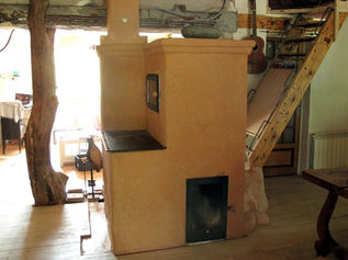 Poeles de masse avec production d'eau chaude ?