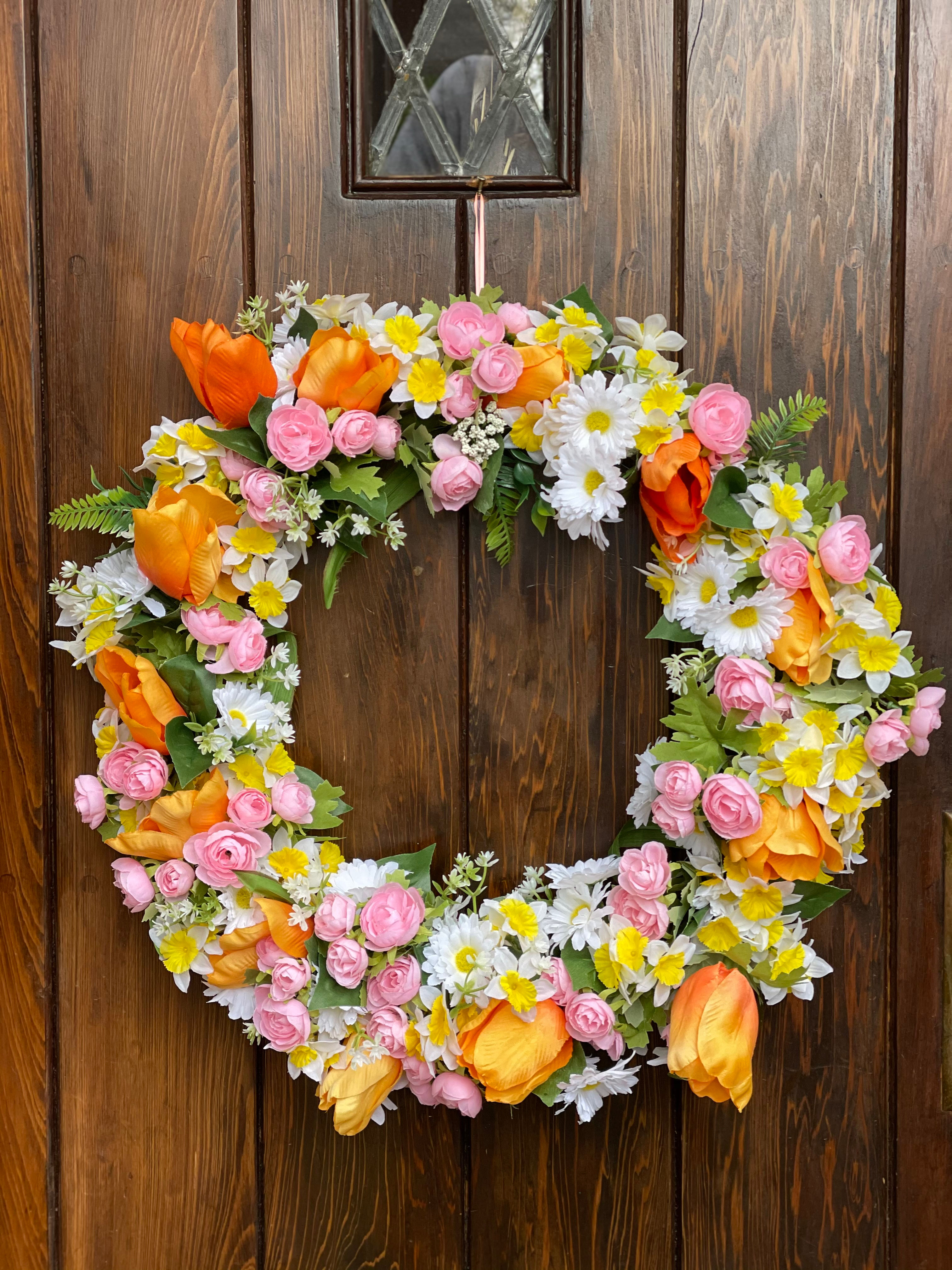 22) Silk Flowers Daisies, Daffodils, Tulips on a metal frame