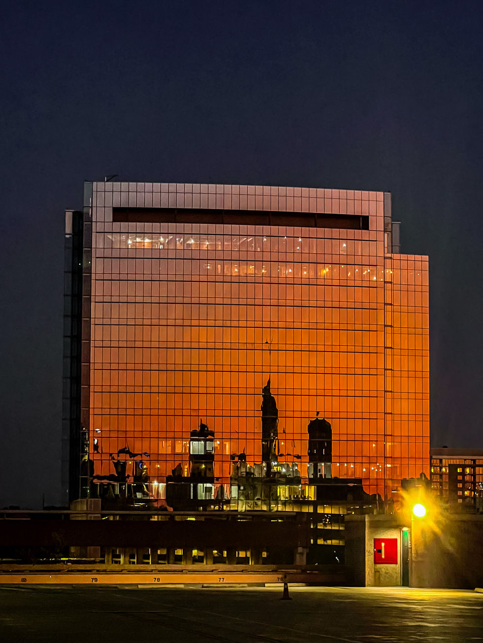 Sunset reflections on buildings in Downtown Austin, Texas photographed on iPhone.