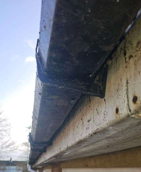 Dirty Gutter Cleaning