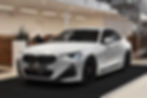 PHOTO D'UNE BMW SERIE 2 BLANCHE CHEZ LE CONCESSIONNAIRE BMW QUOILIN DEVENU MAINTENANT BMW LOUYET