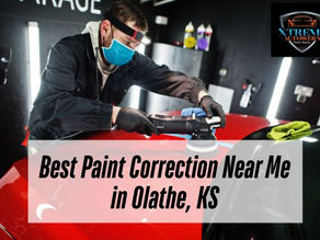 man applying paint correction in a red car with a caption Best Paint Correction Near Me in Olathe, KS