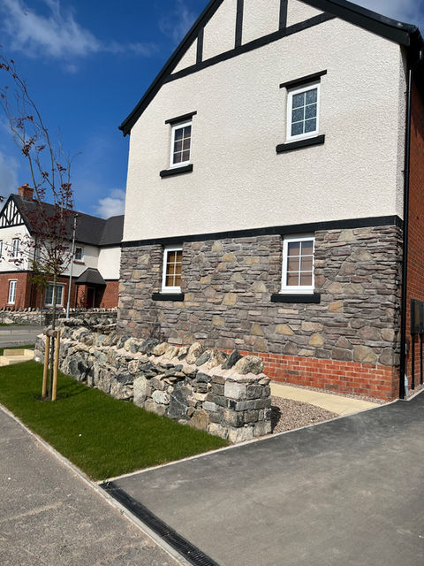 Stone Cladding and Stone Perimeter Wall