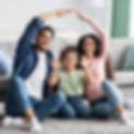 Family care. Arabic parents making symbolic roof of hands above cute little daughter while