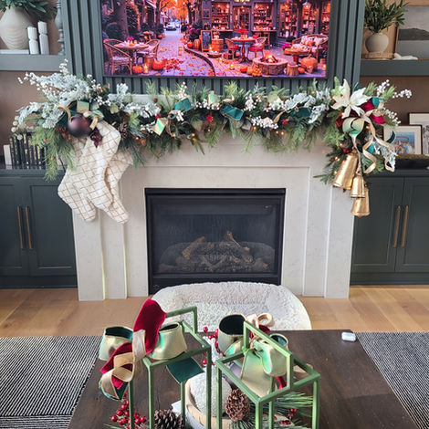 Stunning mantel with stockings and bells