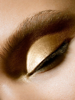 A woman's eye closeup of their makeup this showcases what page you will be sent to when clicking on the shop makeup section below.