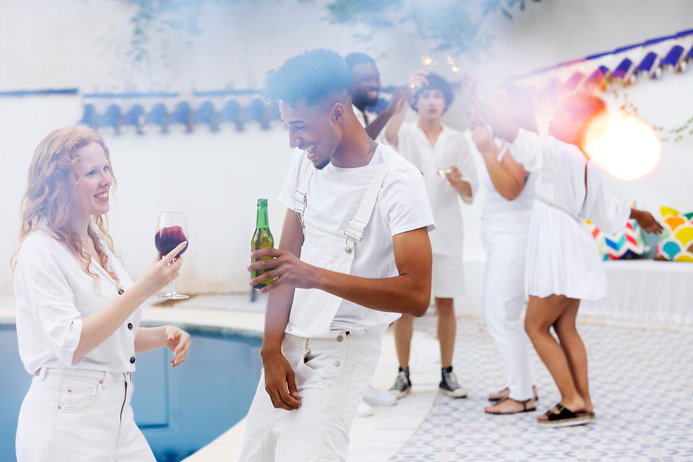 group-friends-having-fun-white-party-with-drinks-by-pool (1)