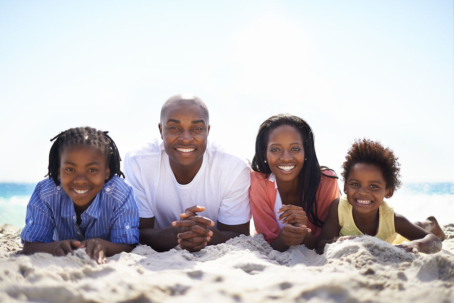 all-lined-up-summer-fun-africanamerican-family-lying-line-beach.jpg