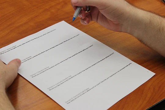 pen and paper with user questions