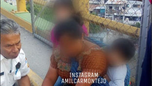 Mujer intenta lanzarse con dos niños desde un puente en Guatemala
