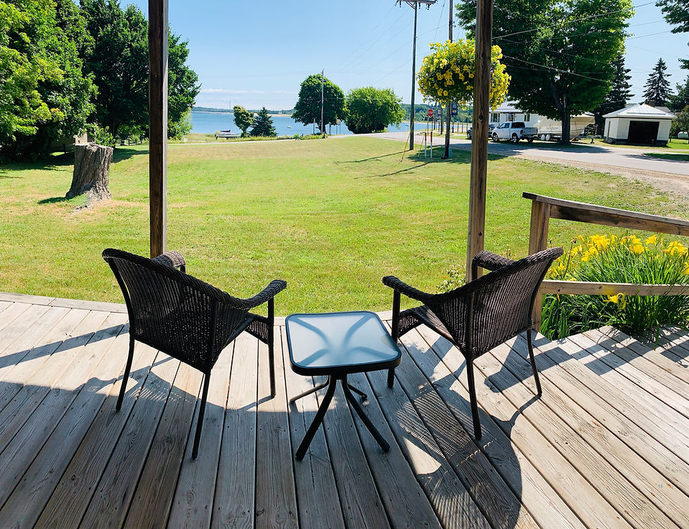 Mariner's Cottage vacation rental a block from downtown Grand Marais, Michigan with view of West Bay