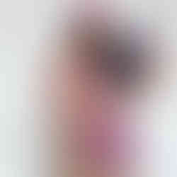 woman with purple fan and purple bikini