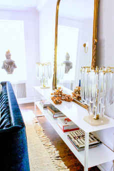 Living room with mirror, lamps, and decor, Nichole Loiacono Design