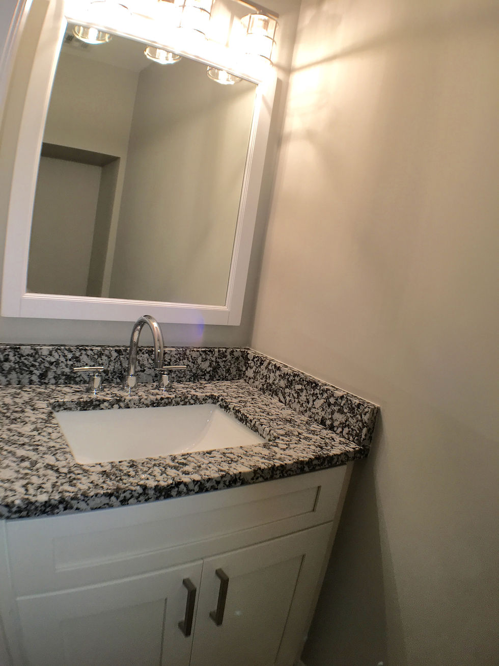 First Floor 1/2 Bath w/ Granite