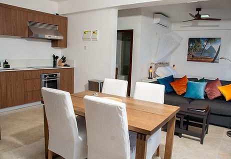 Experience luxury in Suite Zinfandel, a studio with sea views, a wraparound balcony, and full amenities at Villa Vino Lucia.