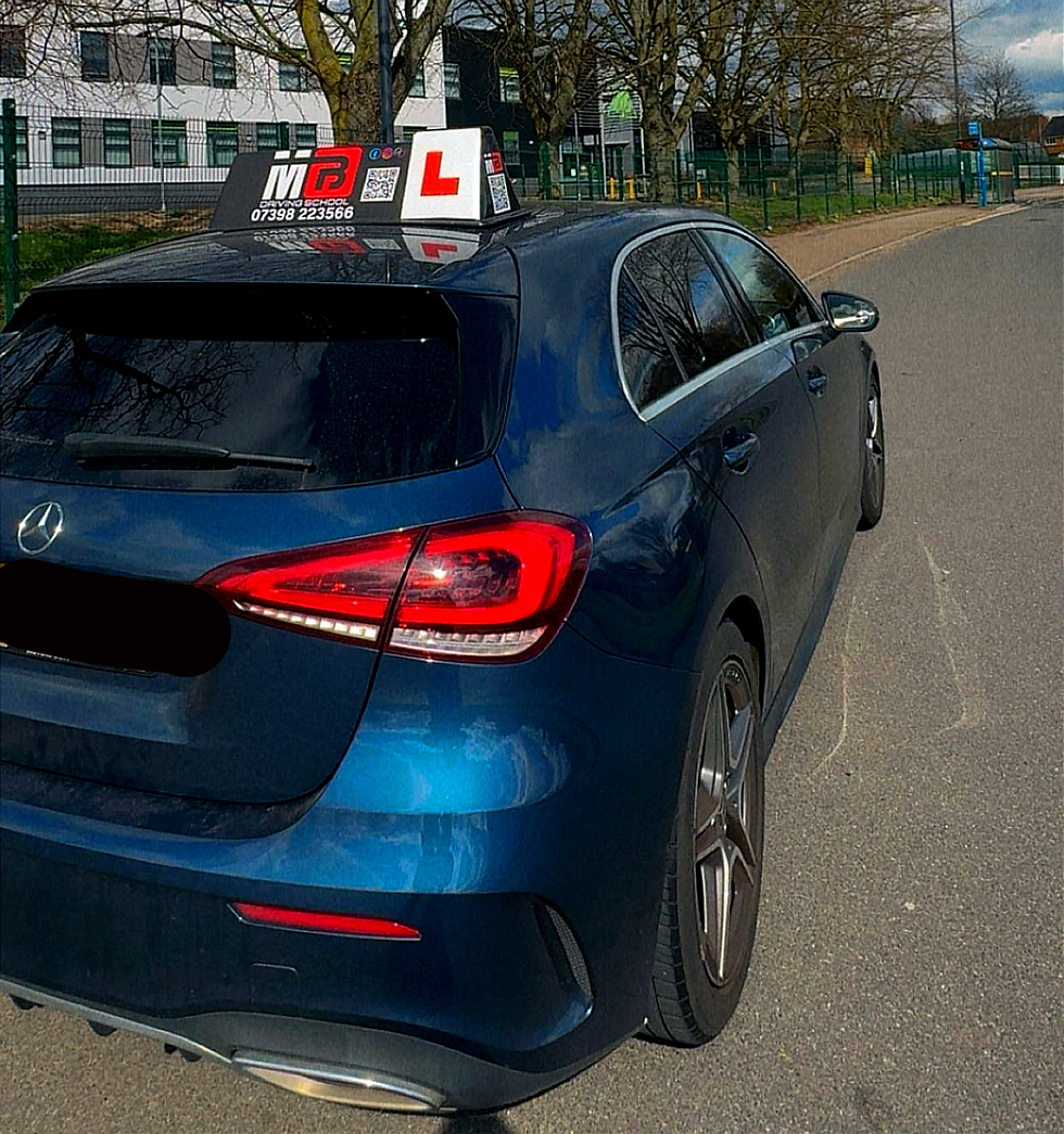 Car parked outside Woodlands School – “MB Driving School car parked outside Allestree Woodlands School Derby – driving lessons Allestree Derby