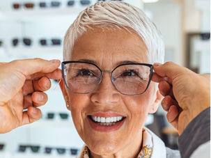 Woman being fitted for glasses