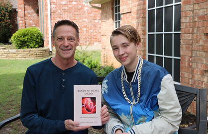 Author Jeff Horacek, first book signing, with son